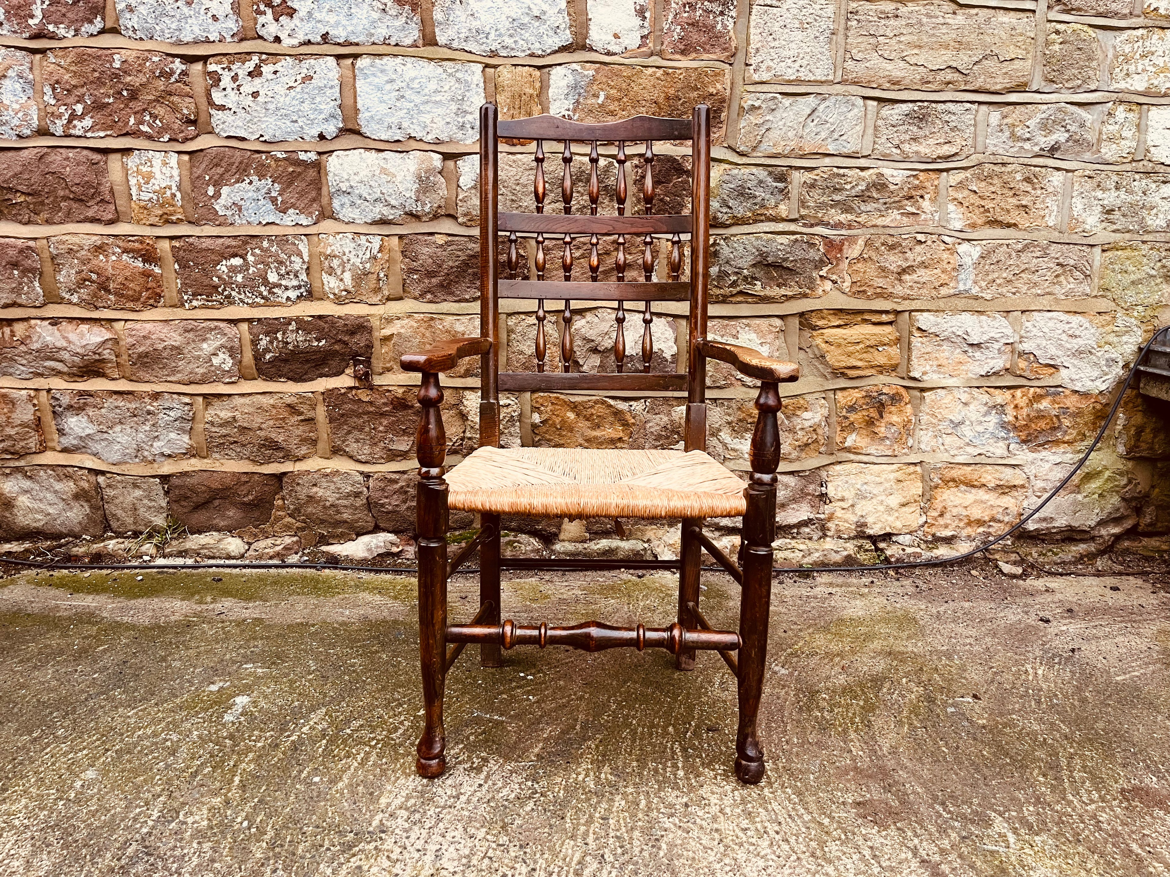 Antique Oak Ladder Back Armchair with Original Rush Seat