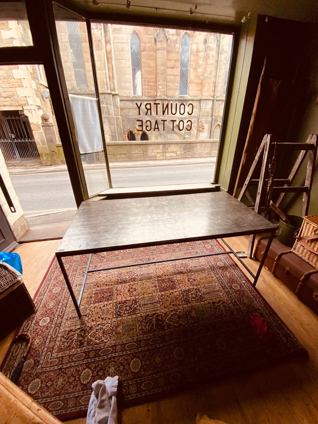 Industrial Metal Dining Table – Vintage Steel Top on Minimal Iron Frame