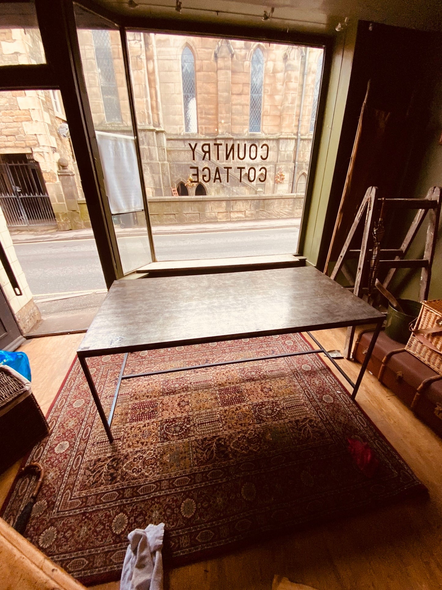 Industrial Metal Dining Table – Vintage Steel Top on Minimal Iron Frame