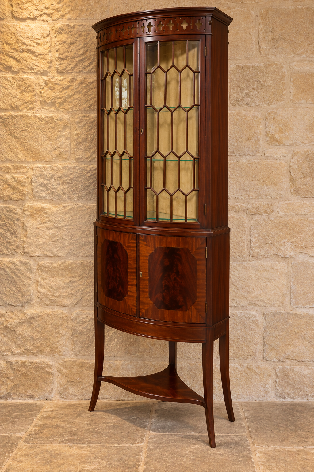 Mahogany bow-front corner display cabinet