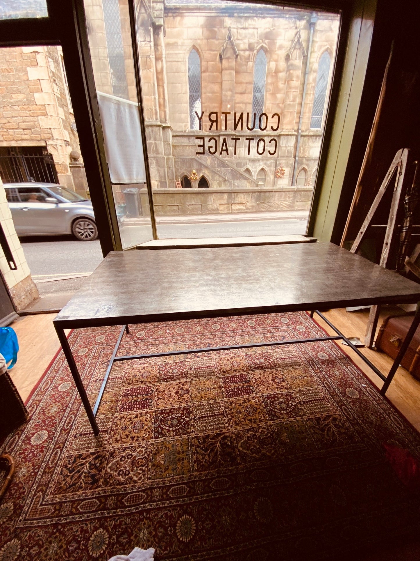 Industrial Metal Dining Table – Vintage Steel Top on Minimal Iron Frame
