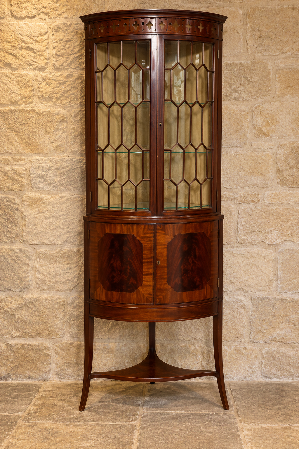 Mahogany bow-front corner display cabinet