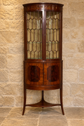 Mahogany bow-front corner display cabinet