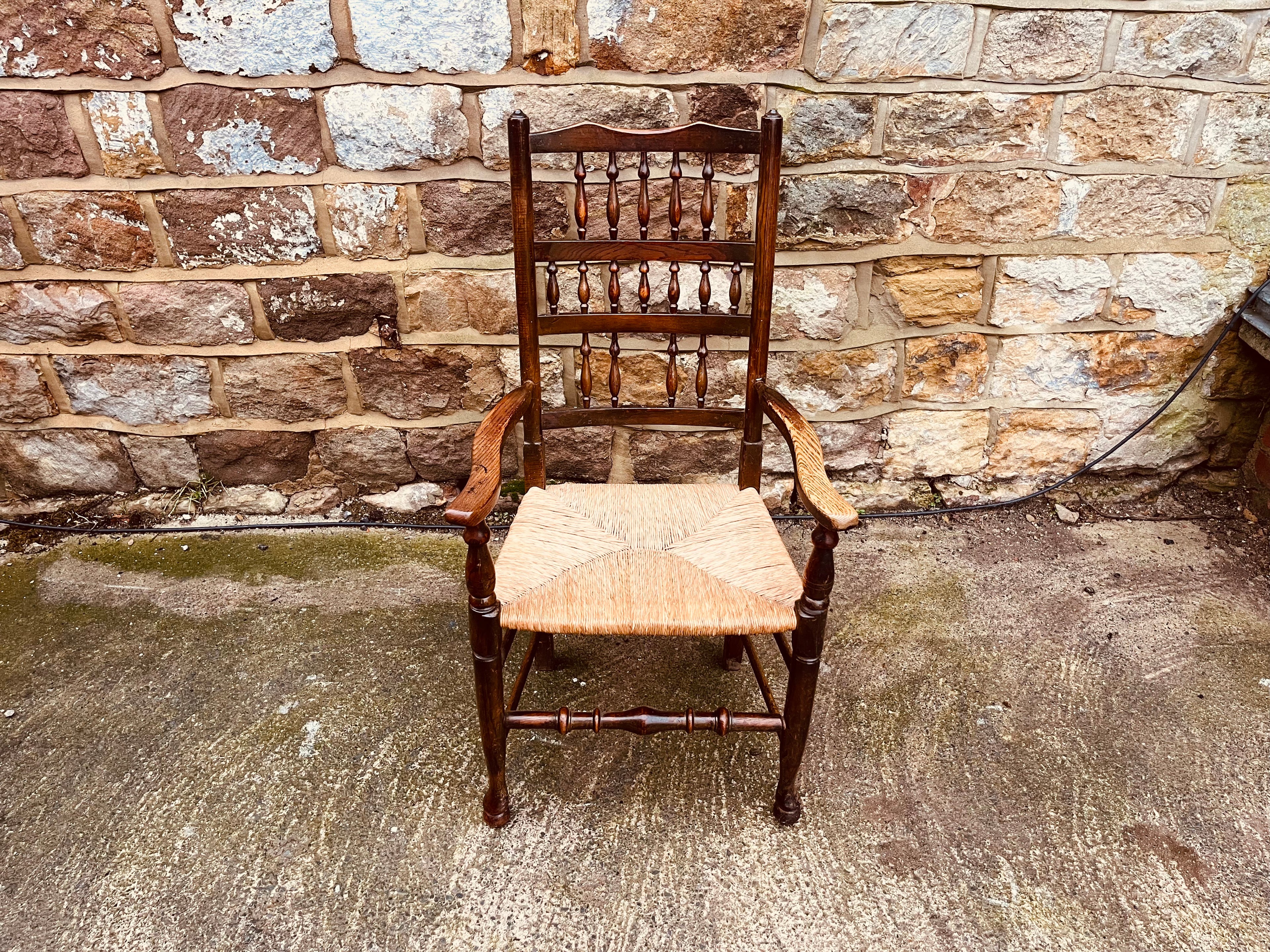 Antique Oak Ladder Back Armchair with Original Rush Seat