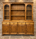 Vintage pine farmhouse dresser with glazed cupboards
