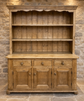 Vintage pine farmhouse dresser with scalloped canopy