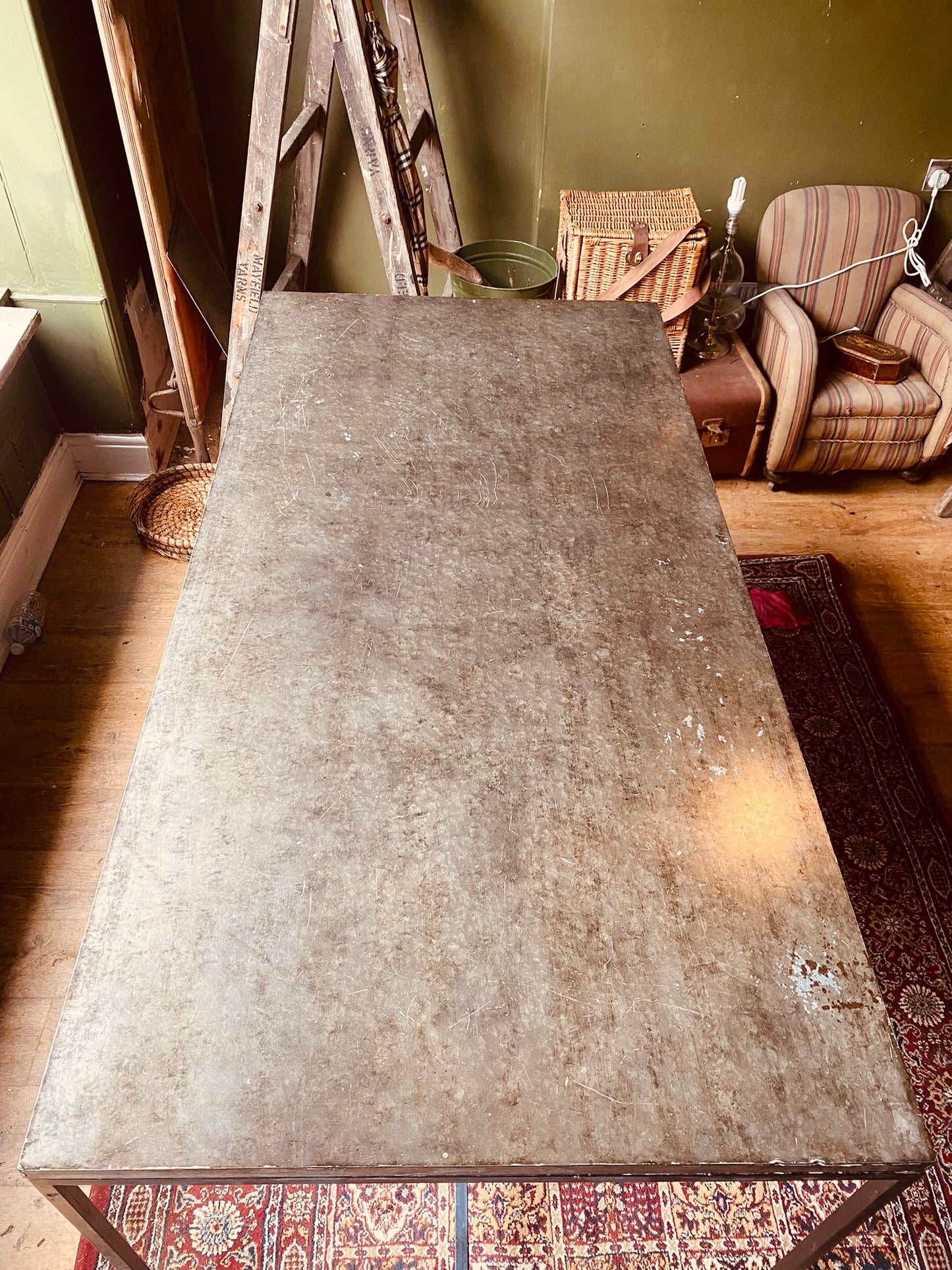 Industrial Metal Dining Table – Vintage Steel Top on Minimal Iron Frame