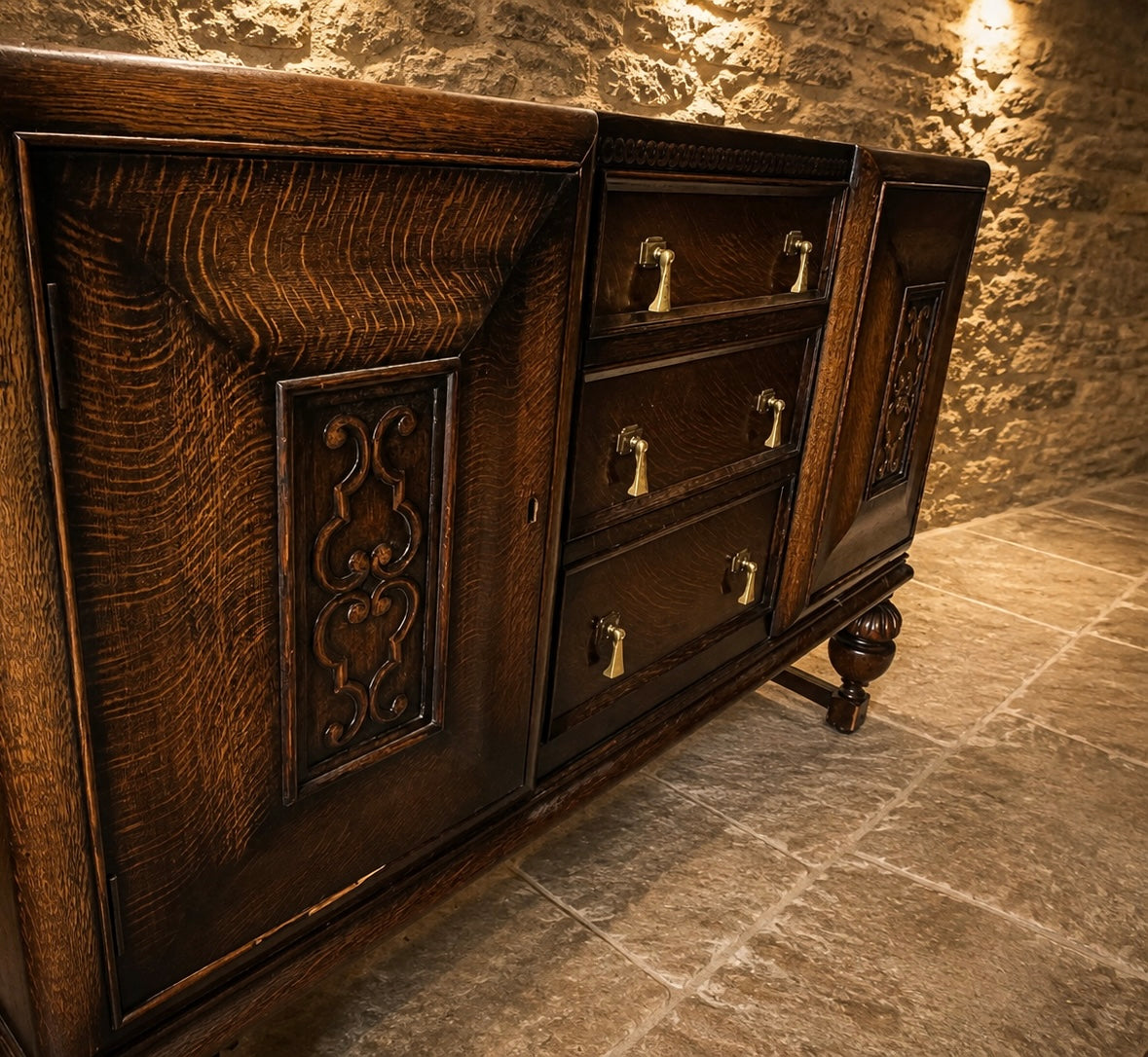 Circa 1930 Jacobean Revival Carved Oak Sideboard