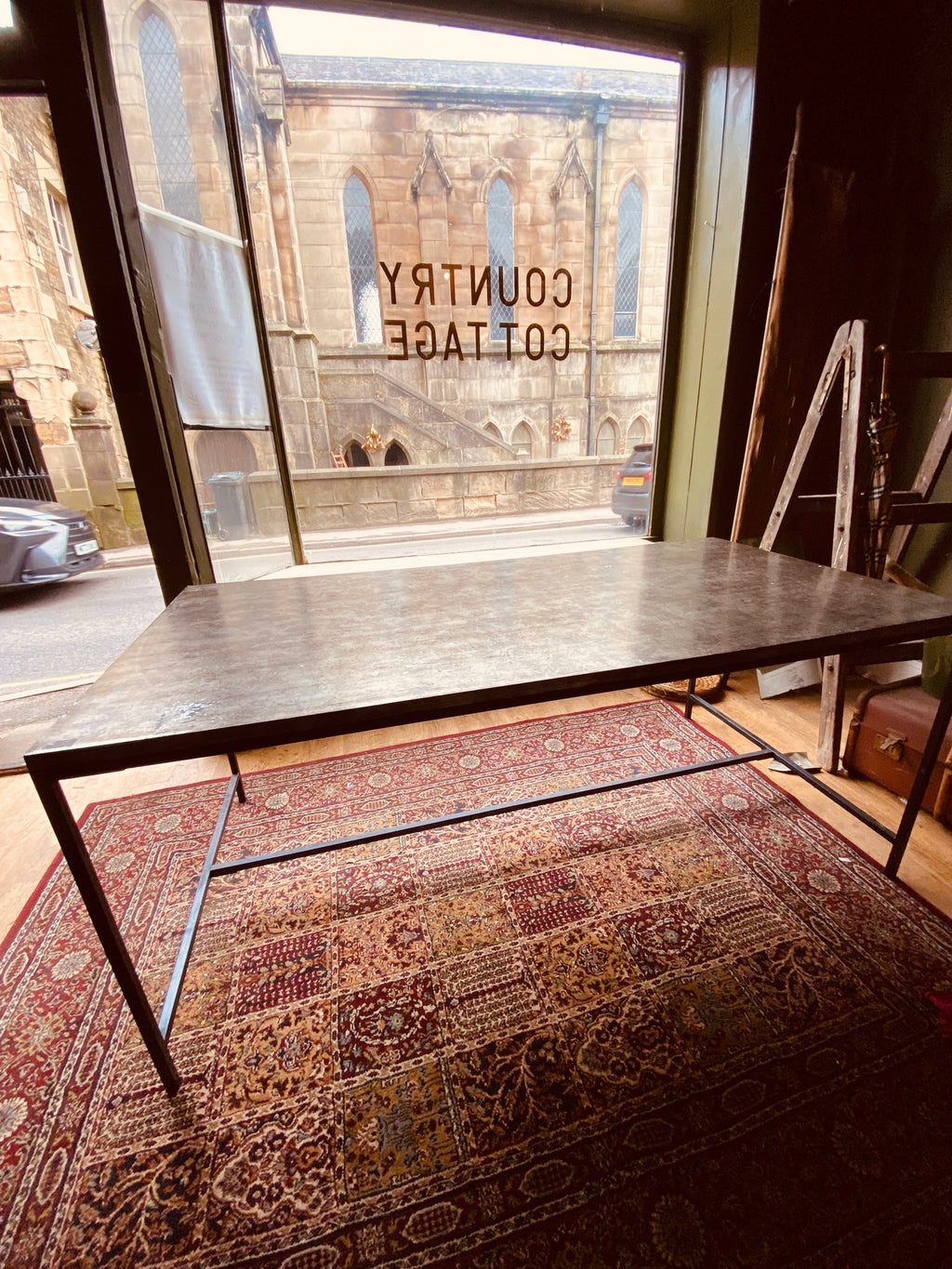 Industrial Metal Dining Table – Vintage Steel Top on Minimal Iron Frame