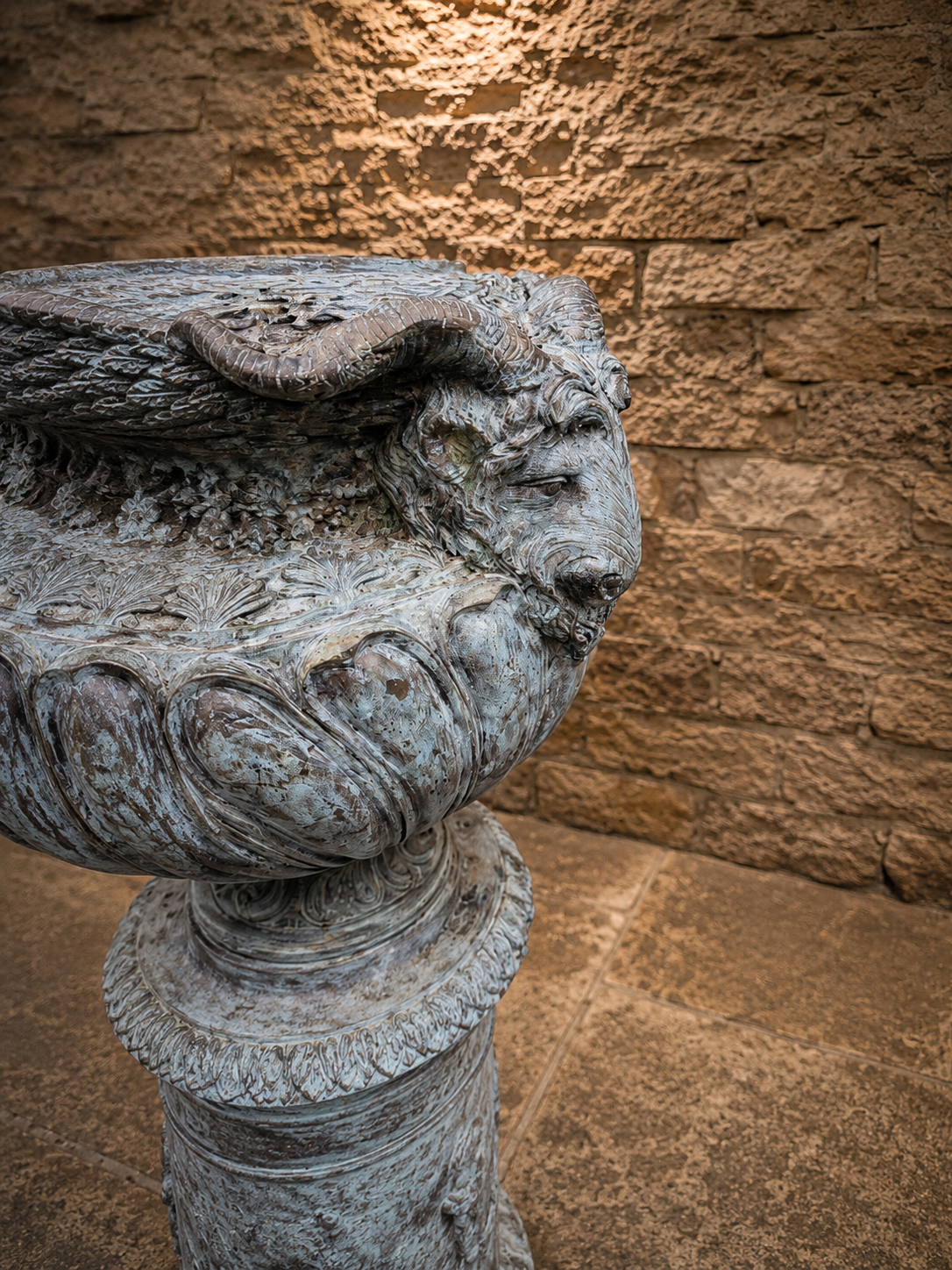 Bronze Neoclassical Garden Urns on Matching Pedestals | Pair of Classical Ram’s Head Urns | French Empire Style Antique Garden Statuary