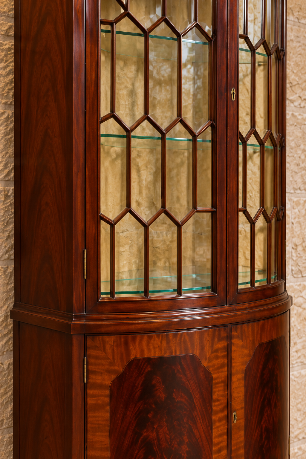 Mahogany bow-front corner display cabinet