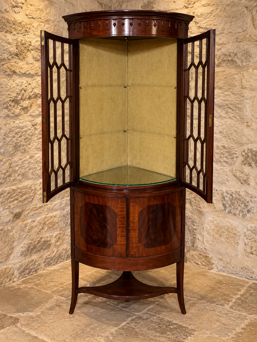 Mahogany bow-front corner display cabinet