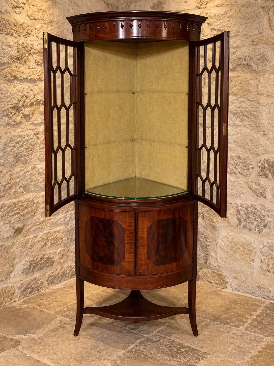 Mahogany bow-front corner display cabinet
