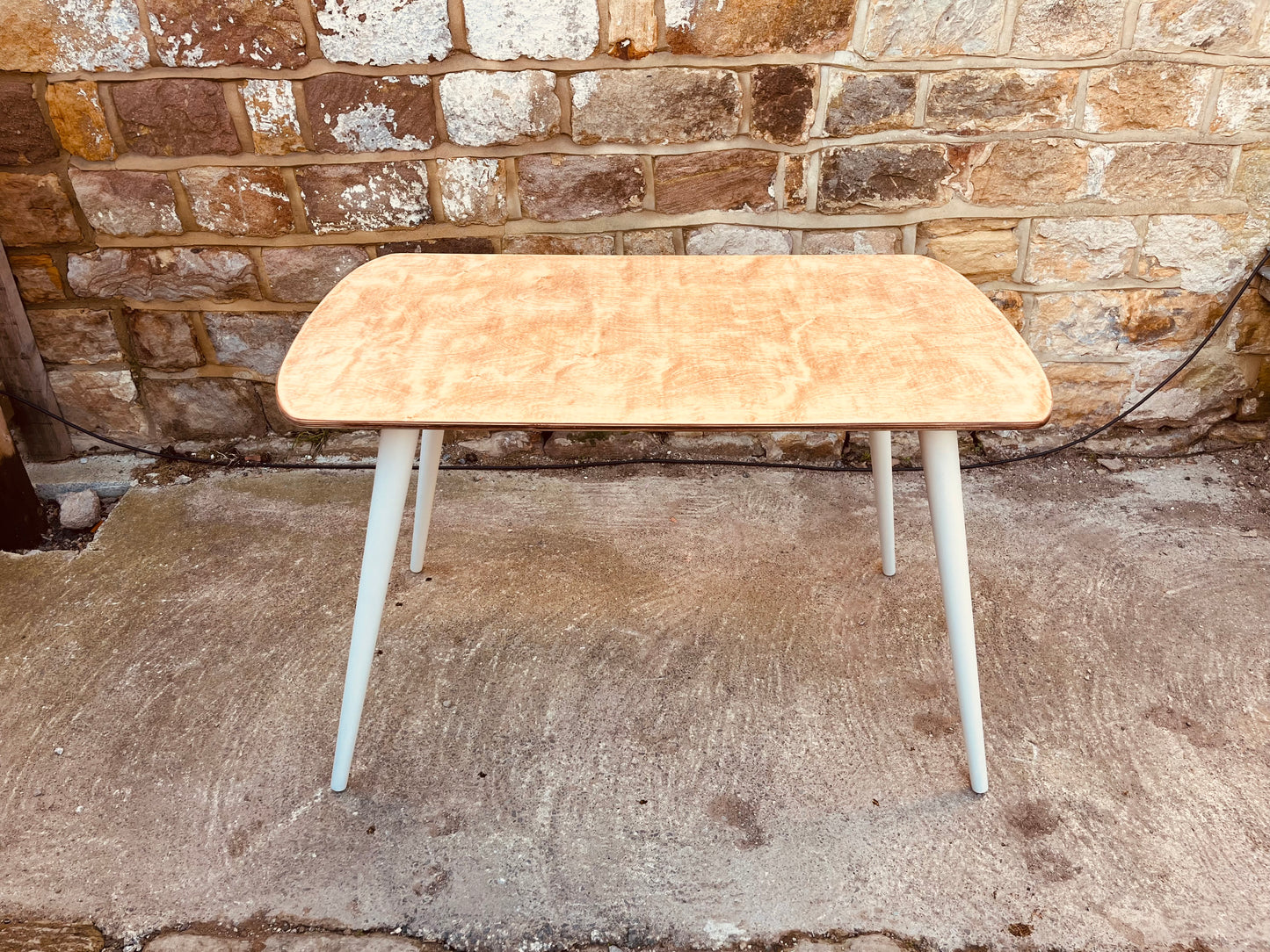 Mid-Century Style Dining Table with Veneered Top and Soft Neutral Legs