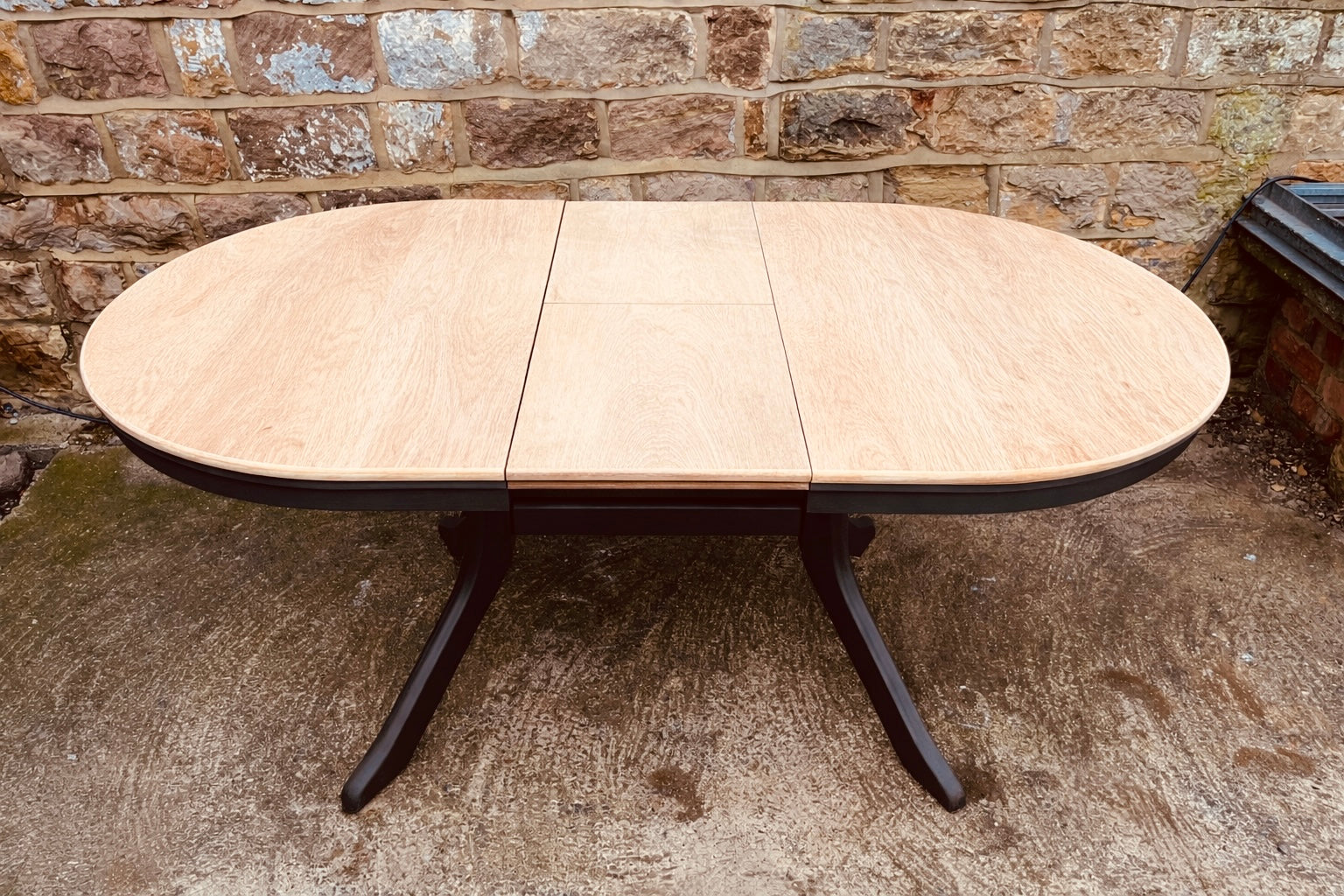 Solid Wood Extending Oval Dining Table with Dark Painted Base