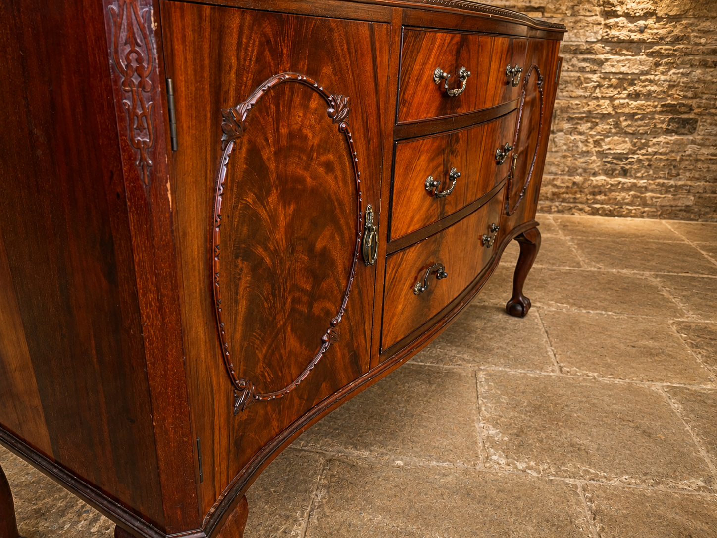 Antique Mahogany Serpentine Sideboard with Figured Veneers – Early 20th Century