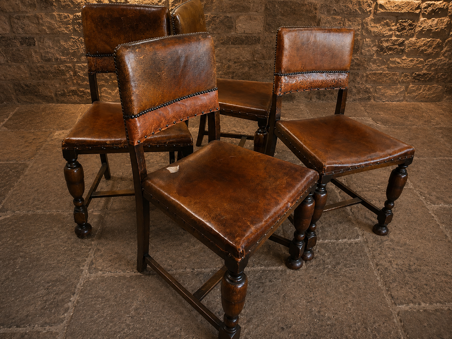 Antique Set of Four Embossed Leather & Oak Dining Chairs | Tudor Revival | Circa 1920s