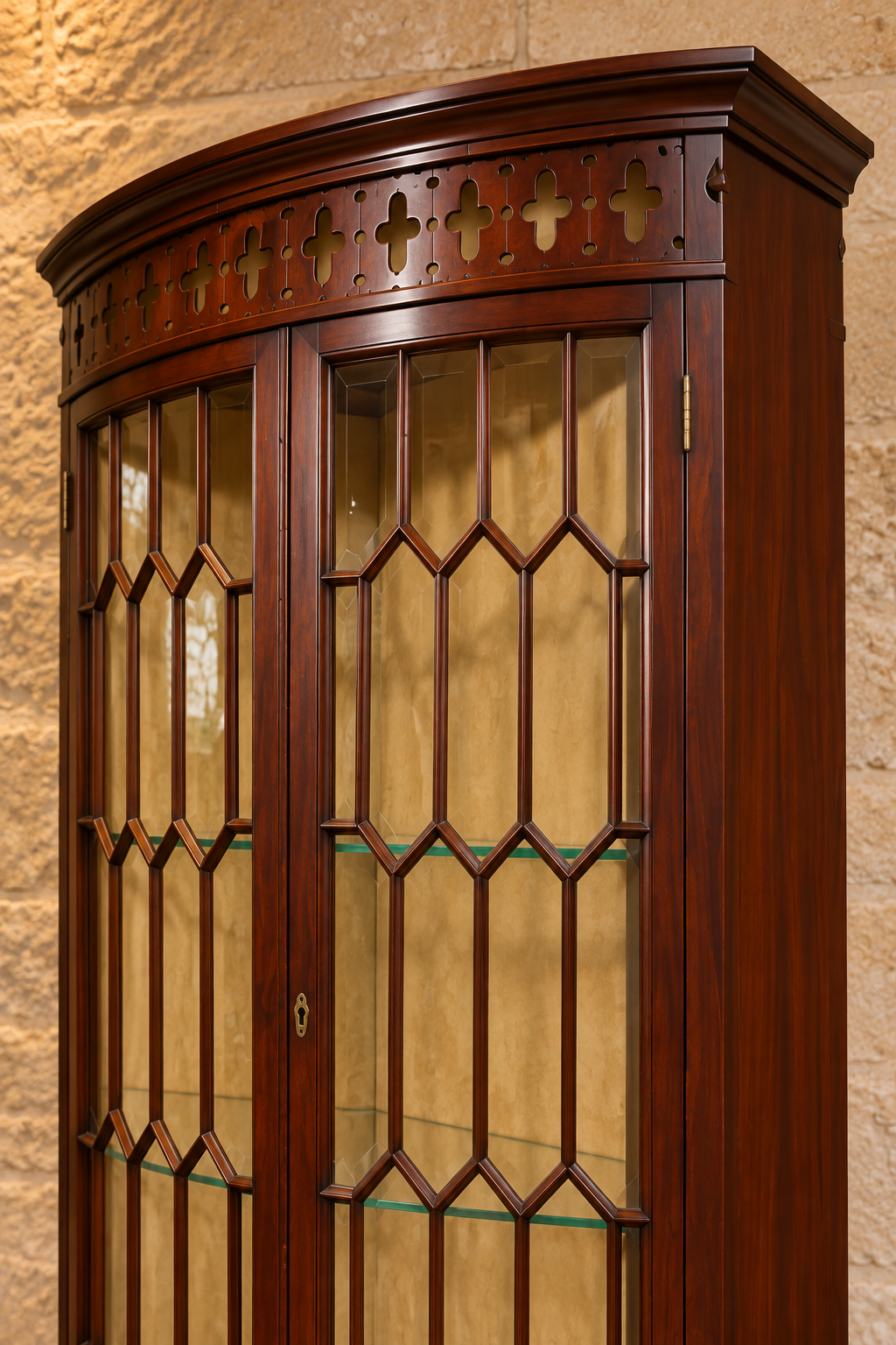 Mahogany bow-front corner display cabinet