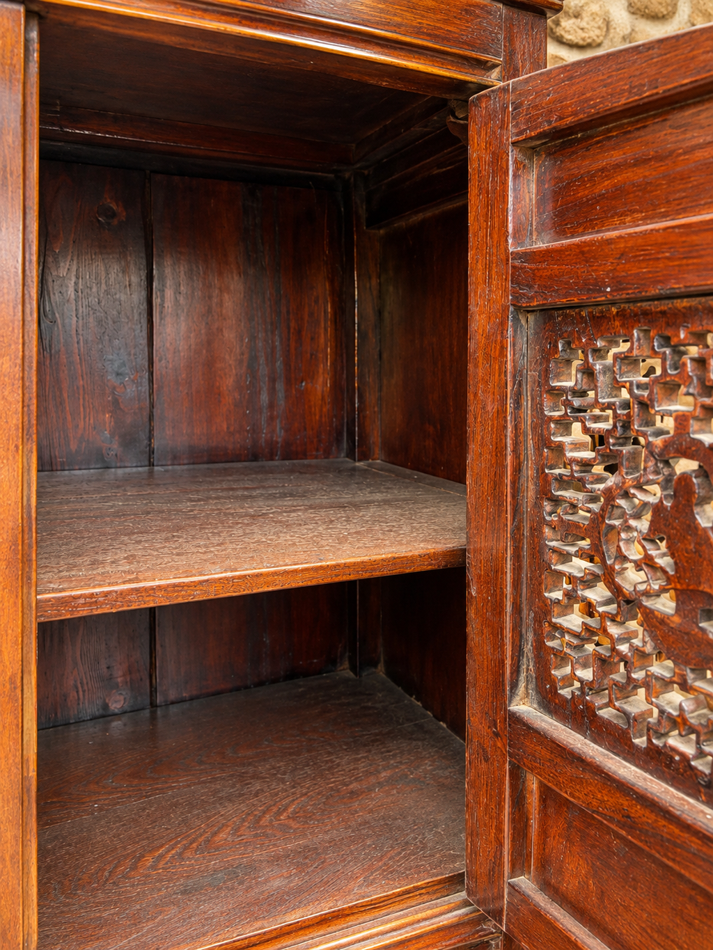 Vintage Chinese carved cabinet with lattice panels