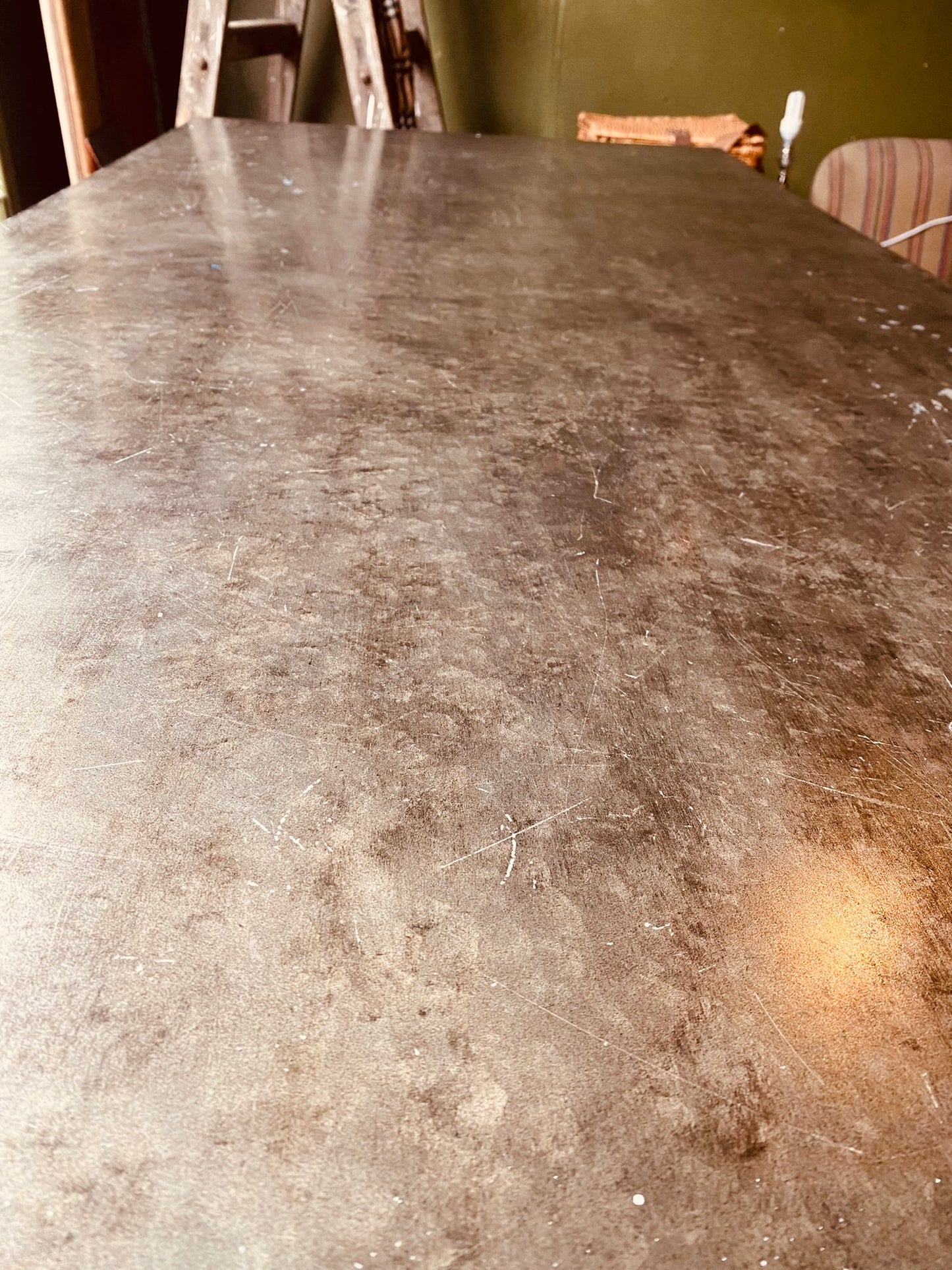 Industrial Metal Dining Table – Vintage Steel Top on Minimal Iron Frame